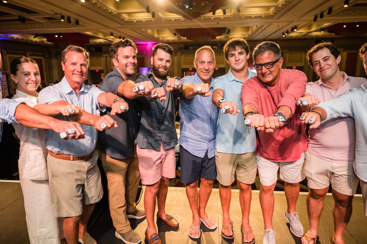 Winning team showing off their championship rings at the Golden Nugget
